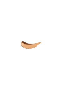 Applicatore curvo di colore rame con superficie liscia e bordo affusolato, progettato per un'applicazione precisa di creme o gel.