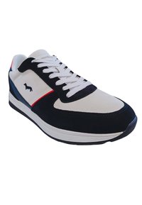 Sneakers caratterizzati da una combinazione di tela bianca e suede nero, dettagli rossi e blu, punta arrotondata e chiusura tradizionale con lacci. Suola in gomma.