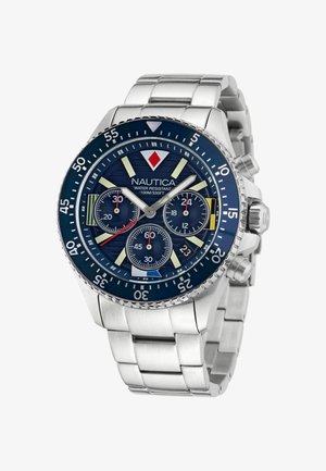 Uhani iz nerjavečega jekla z modrim številčnikom, svetlečimi kazalci, črnimi podštevilčniki in vodoodpornostjo do 100 m. Ima srebrn pas.