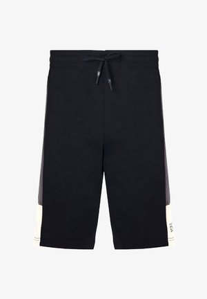 Pantaloni sportivi neri con vita elasticizzata e cordino. Presentano accenti bianchi sui lati e una texture di tessuto liscia.