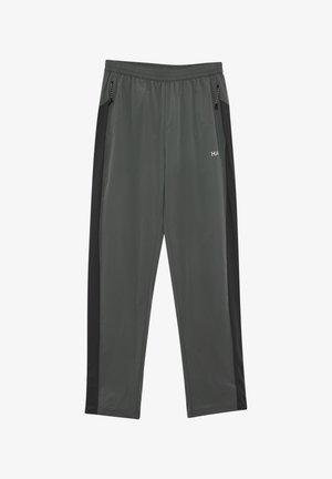 Ciemnoszare spodnie sportowe z czarnymi bocznymi panelami, elastycznym pasem i kieszeniami na zamek.