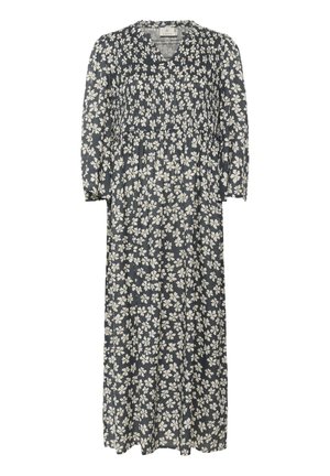 Robe maxi florale en bleu marine avec des fleurs blanches. Décolleté en V, corsage froncé élastique, manches trois-quarts, tissu léger et doux.