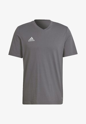 Sivá v-neck tričko vyrobené z bavlnenej zmesi, s krátkymi rukávmi a bielym logom Adidas na hornej ľavej strane hrudi. Mäkka, hladká textúra.