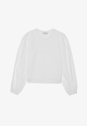 Witte sweatshirt met een eenvoudige body en doorschijnende pofmouwen met een stippenpatroon. Ribgebreide manchetten en zoom met een ronde hals.