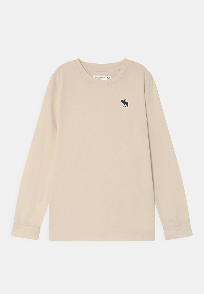 Beiges langärmeliges Rundhalsshirt mit kleinem schwarzem Elch-Logo auf der linken Brust, für Kinder entworfen, auf weißem Hintergrund flach ausgelegt.