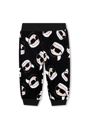 Zwarte sweatpants met bedrukt cartoongezicht dat een zonnebril draagt; heeft een elastische tailleband en boorden, gemaakt van zachte stof.