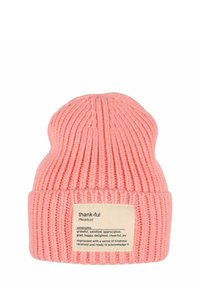 Pink knitted beanie with ribbed texture and a folded brim. Features a rectangular label displaying the definition of "thankful."