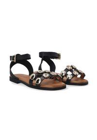 Zwarte leren sandalen met gouden metalen accenten, open teendesign, verstelbare enkelband, platte zool en een gladde tan voetbed.