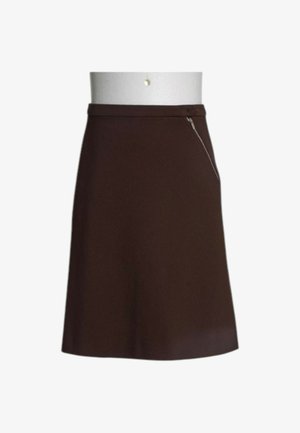 Jupe trapèze marron foncé avec un détail de fermeture éclair latérale, présentée sur un buste de mannequin blanc sur un fond uni.
