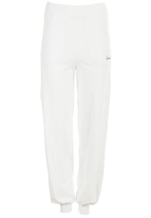 Weiße Sweatpants aus weichem Material, mit einem elastischen Bund, zwei Fronttaschen und einem kleinen Logo-Detail an der Seite. Schmal zulaufende Beinform.