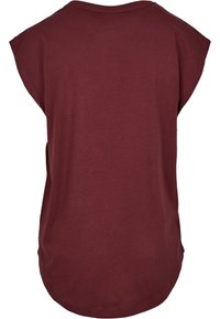 Vue arrière d'un t-shirt uni bordeaux à manches courtes, col rond et coupe ample.