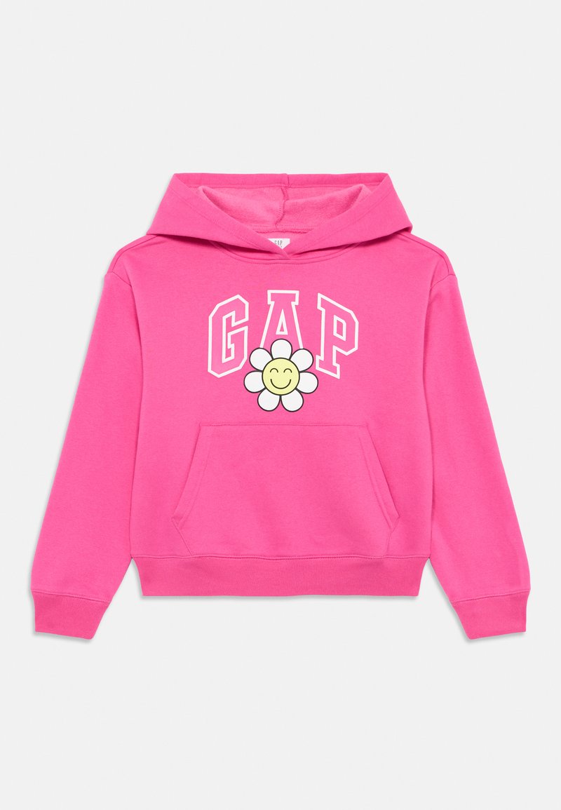 Sweatshirt rosa com um bolso frontal, apresentando um grande logo "GAP" e uma ilustração de uma flor com um rosto sorridente. Feito de um tecido macio.