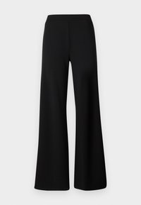 Pantalon noir taille haute à jambes larges avec devant épuré, sans poches ni boutons visibles sur fond gris clair.