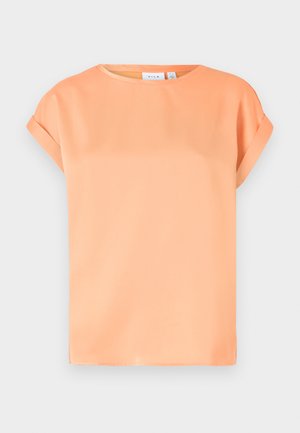 T-shirt à manches courtes en tissu orange doux. Encolure ronde, coupe décontractée avec des poignets retroussés. Texture lisse avec un léger éclat.