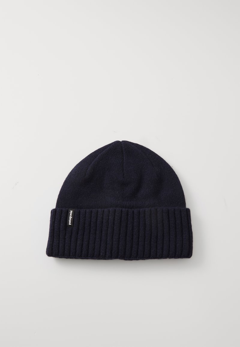 Navy knit beanie with a ribbed cuff. Soft wool blend fabric. Features a small black label on the side. Rounded top with a snug fit.