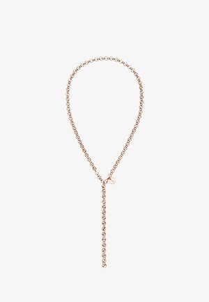 Collier chaîne en or rose avec des perles rondes et enchaînées, accompagné d'une chaînette d'extension pendante ornée d'un petit charme circulaire.