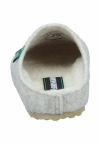 Wool slipper in light gray with a soft textured interior, rounded slip-on design, and a light rubber sole. Features a black and green label.