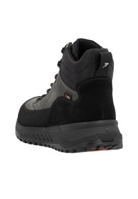 Schwarze Wanderschuhe mit Obermaterial aus Wildleder und synthetischem Material, Schnürung, gepolstertem Schaft, R-Tex-Logo und rutschfester Gummisohle.