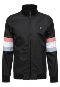 Schwarze Zip-Jacke mit rosa, weißen und hellblauen Streifen an den Ärmeln und einem kleinen gelben bestickten Vogel-Logo auf der Brust.