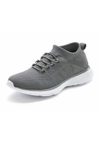 Gray knit athletic shoe with a high collar, elastic laces, and a white rubber sole. Features textured patterns across the upper.