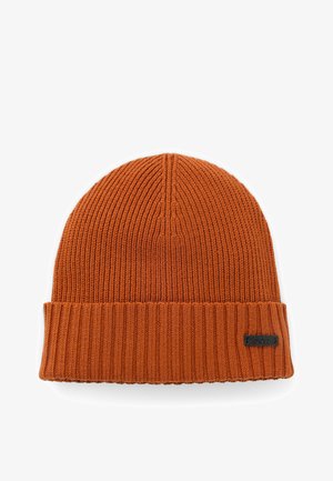 Orange knitted beanie with a ribbed texture, a folded cuff, and a small black logo patch on the side.