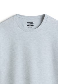 Gray short-sleeve T-shirt made from soft fabric. Features a crew neckline and printed label indicating "VANS CLASSIC FIT SMALL."