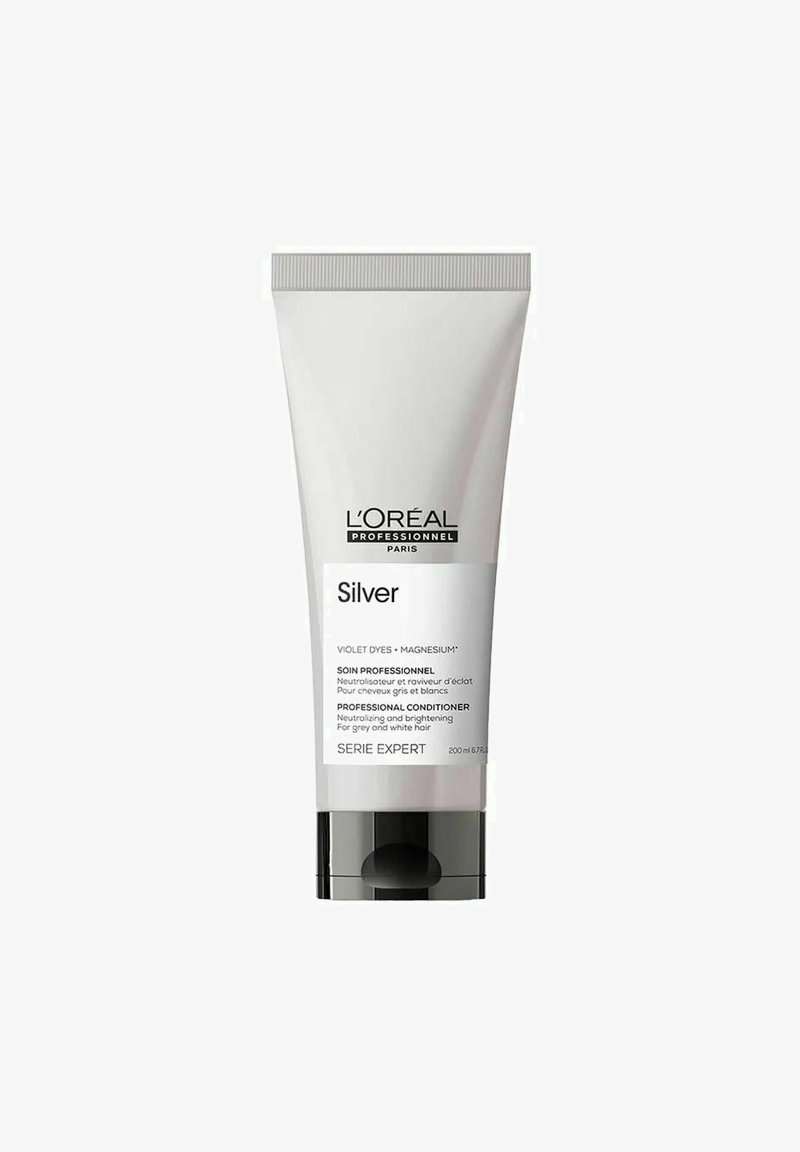 L'Oréal Professional conditioner in een witte tube van 200 ml met een zwarte pompdeksel, gelabeld "Silver," ontworpen om grijs en wit haar te neutraliseren.
