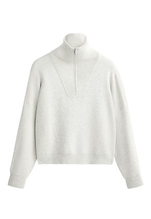 Light gray knitted pullover with a high collar and quarter zip. Features dropped shoulders and ribbed texture. Relaxed fit.