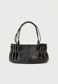 Black leather handbag with a structured base, dual handles, and gathered accents on sides. Smooth texture and minimalistic design.