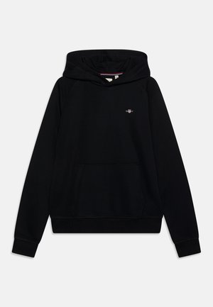Black hoodie with a front pocket, ribbed cuffs, and hem. Features a small embroidered logo on the chest. Soft fabric and relaxed fit.