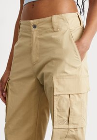 The North Face PANT - Cargobyxor - khaki stone