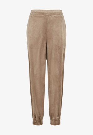 Sametové jogger nohavice svetlohnedej farby, s elastickým pásom, textúrovanou tkaninou a rebrovanými manžetami na členkoch.