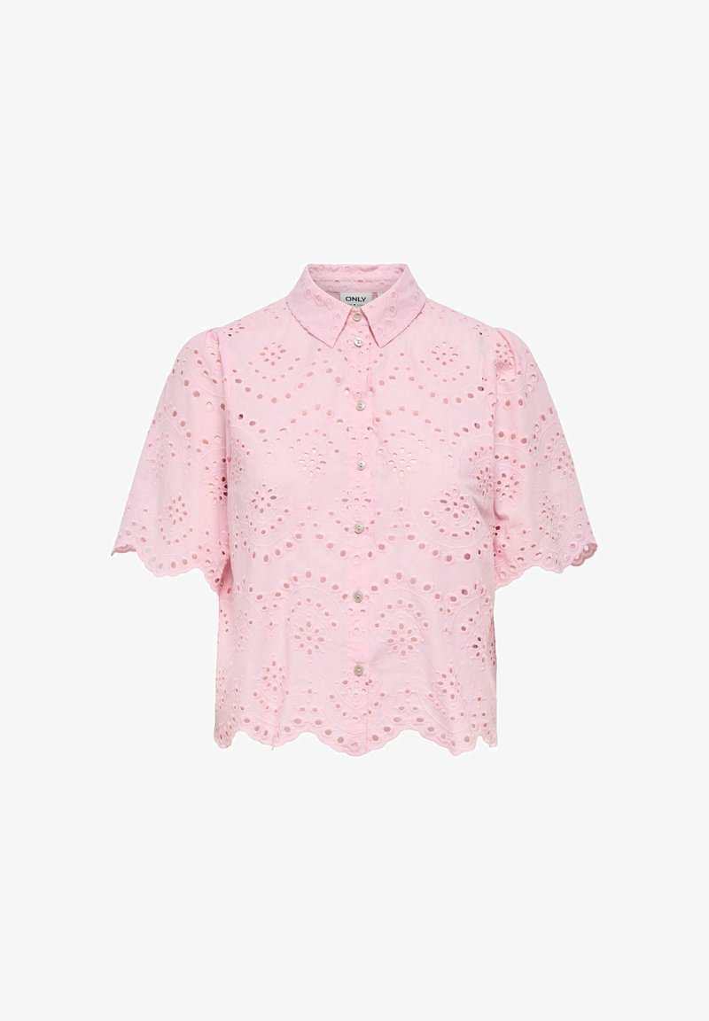 Chemisier rose clair à manches courtes avec broderie à jours, bords festonnés et col pointu.