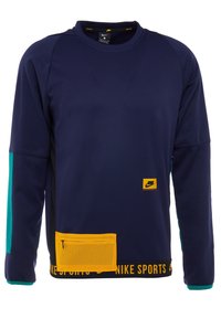 Felpa blu navy con maniche lunghe, caratterizzata da pannelli accentati in teal, una tasca in rete gialla e il logo Nike giallo sul davanti.