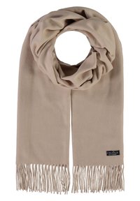 Beige sall, mis pehme materjali ja silmustega disainiga. Ottedel on pikad narmad. Väike logo silt on nähtav ääres.