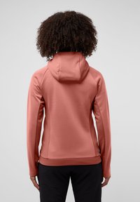 Fitted, hooded Jacke in Korallenpink, aus strukturiertem Stoff, mit langen Ärmeln und einem glatten Design mit Raglannähten.