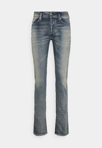 Mörkblå denimjeans med rak benform, med fem fickor, knäppning fram med knapp och lätt urtvättning på låren.