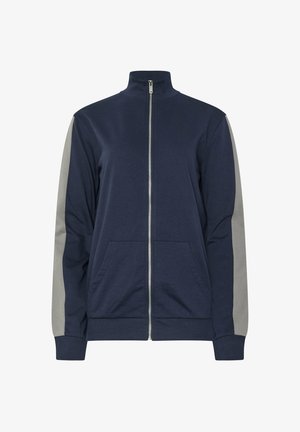 Granatowa bluza zapinana na zamek z szarymi panelami bocznymi, wysokim kołnierzem i dwoma przednimi kieszeniami. Wykonana z miękkiego materiału z ściągaczami na mankietach i u dołu.