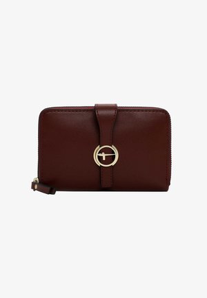 Burgundy leather wallet with a zip closure, gold circular accent, and a flap with a strap. Smooth texture and contrasting stitching details.