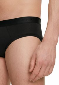 FALKE DAILY CLIMATE CONTROL OUTLAST® - Slip - black