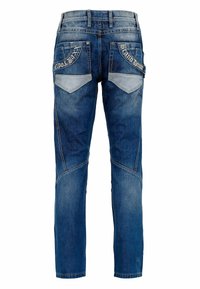 Blaue Denim-Jeans mit schmal zulaufendem Bein, ausgestattet mit kontrastierenden hellblauen Patches auf den Gesäßtaschen und dekorativen Nähten.