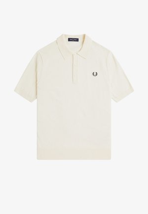 Cremefarbener Polo-Shirt mit kurzen Ärmeln, drei Knöpfen und einem kleinen schwarzen Lorbeerkranz-Logo auf der linken Brust.