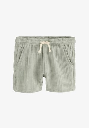 Lysegrønne bomuldsshorts med ribbet tekstur, elastisk talje og snøre. Har to sidelommer.