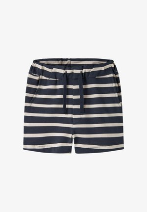 Granatowo-beżowe szorty w poziome paski z elastycznym pasem, sznurkiem i bocznymi kieszeniami, ułożone płasko na białym tle.