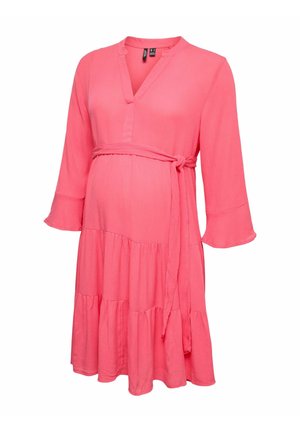 Coral pink maternity dress with V-neck, three-quarter ruffle sleeves, tiered skirt, and adjustable waist tie belt.