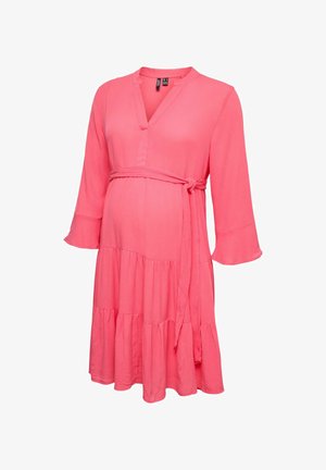 Coral pink maternity dress with V-neck, three-quarter ruffle sleeves, tiered skirt, and adjustable waist tie belt.
