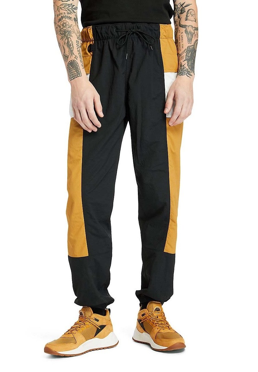 Timberland YC OUTDOOR ARCHIVE CLIMBING JOGGER - Pantaloni outdoor - black  white sand wheat/nero-screziato - Zalando.it