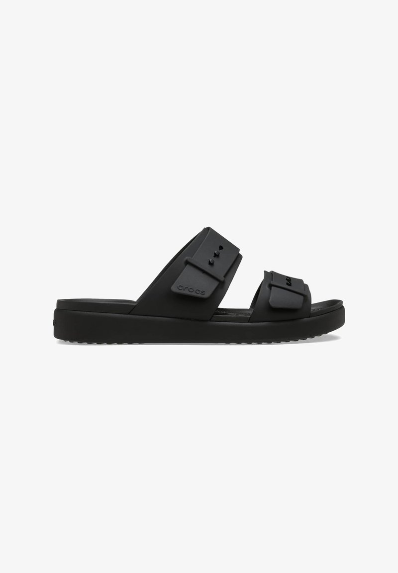 Sandale slide noire avec deux brides réglables et semelle rembourrée, conçue pour une utilisation décontractée et le confort.