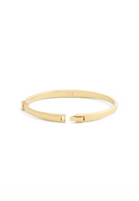 Bracciale in metallo dorato con un design elegante e minimale, dotato di chiusura a molla e estremità aperte. Superficie liscia con una finitura lucida.