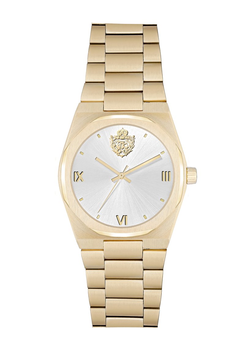 Gold metal watch featuring a silver dial, octagonal case, prominent lion emblem, Roman numerals, and a brushed link bracelet.